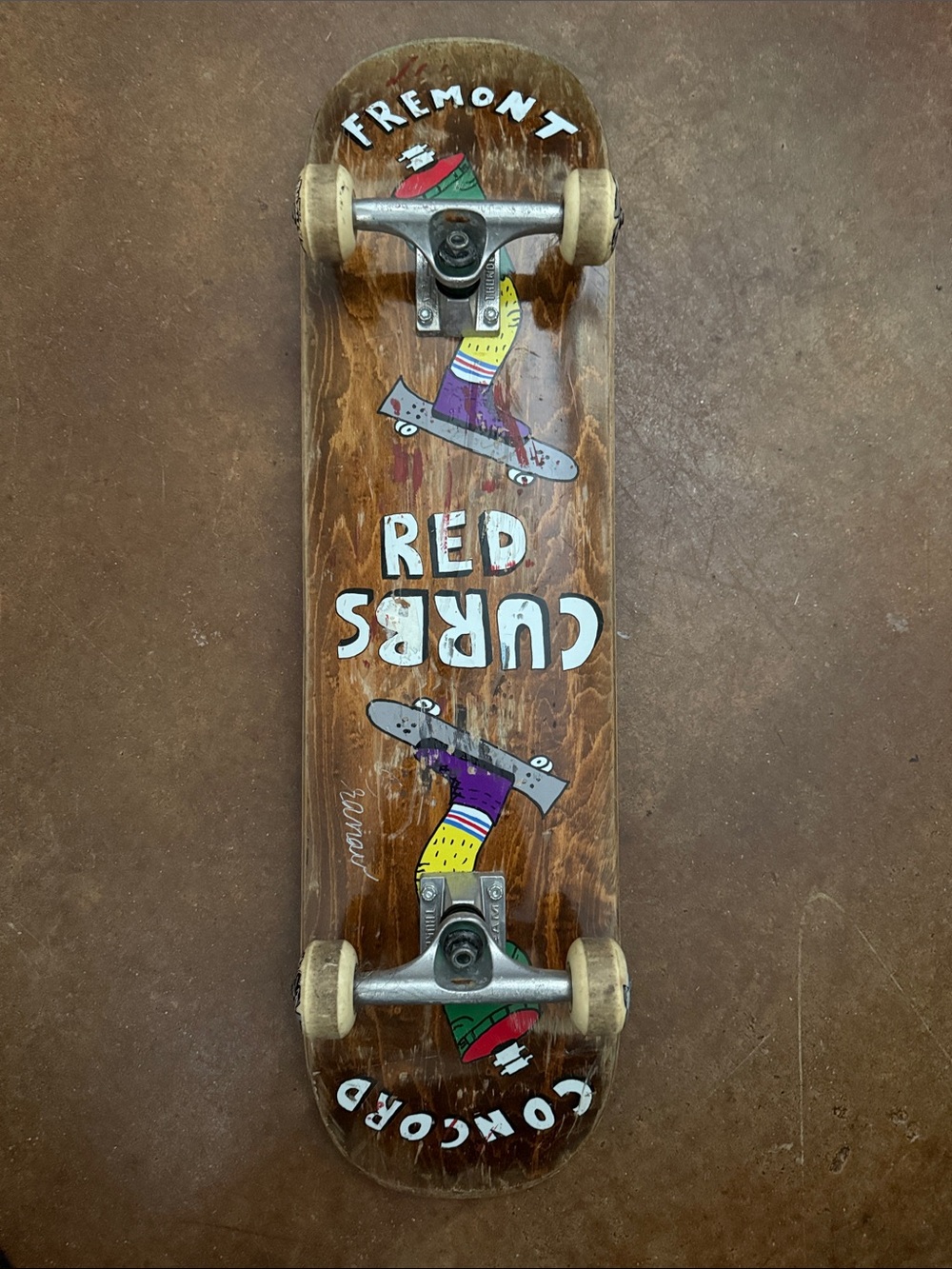 Red Curb  Skateboard by Red Curb - Brown Deck with Multicolor Graphic